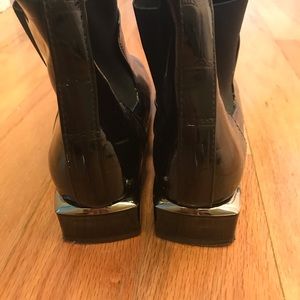 Funky black patent leather pull on ankle booties